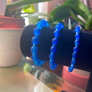 Dark blue bracelets and they are for any gender